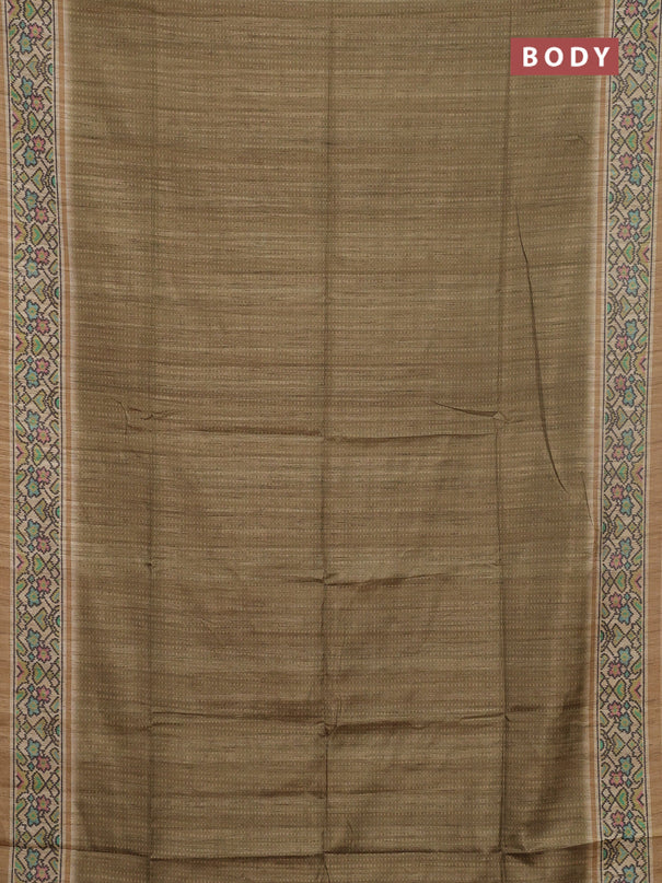 Art tussar saree mehendi green and beige with allover prints and patola printed border