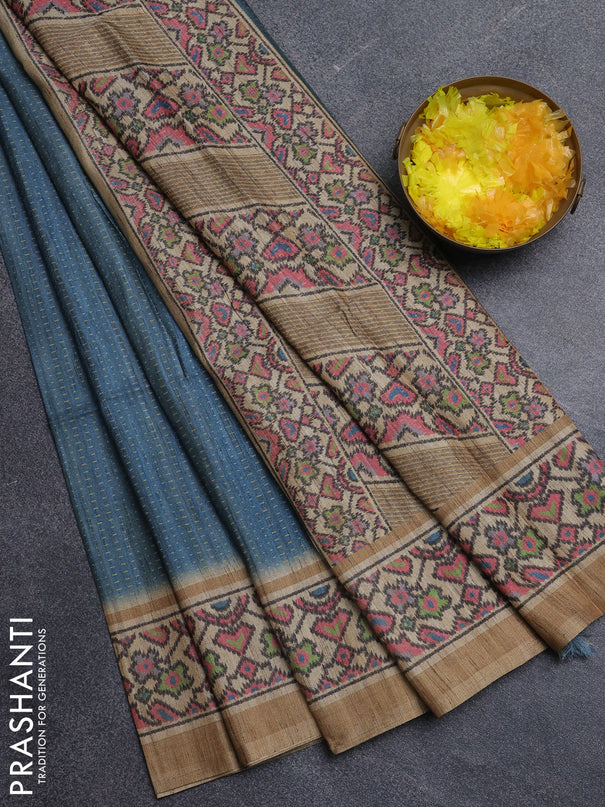 Art tussar saree pastel blue and beige with allover prints and patola printed border