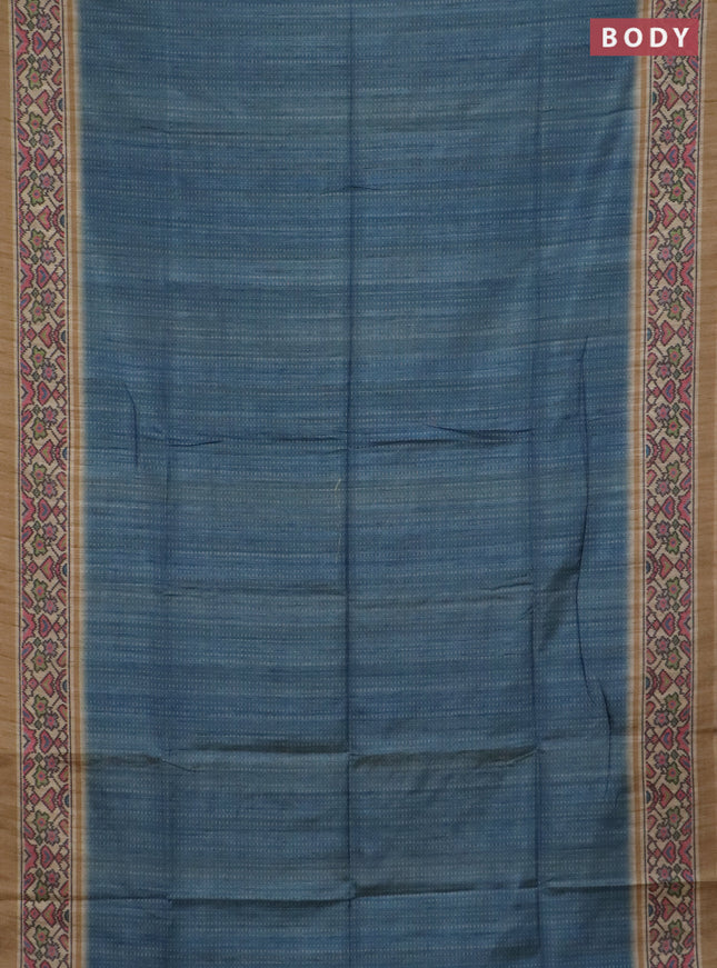 Art tussar saree pastel blue and beige with allover prints and patola printed border