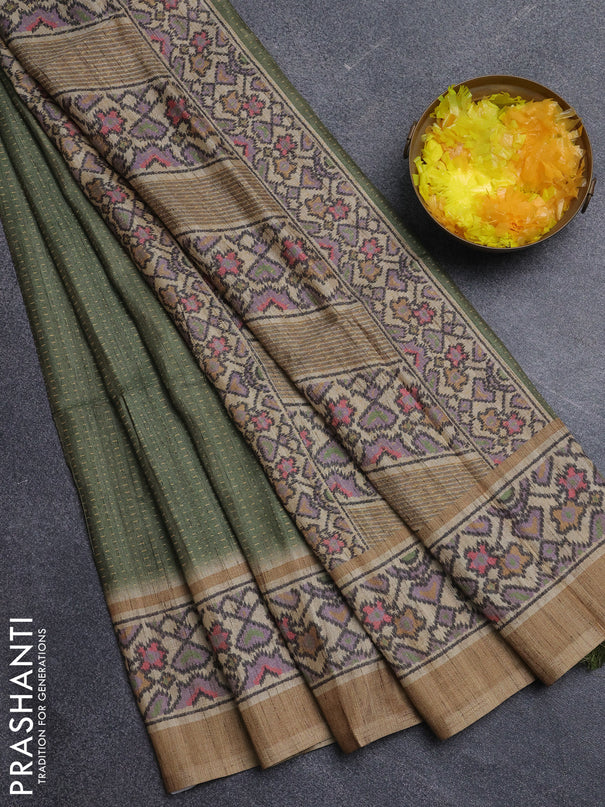 Art tussar saree green and beige with allover prints and patola printed border