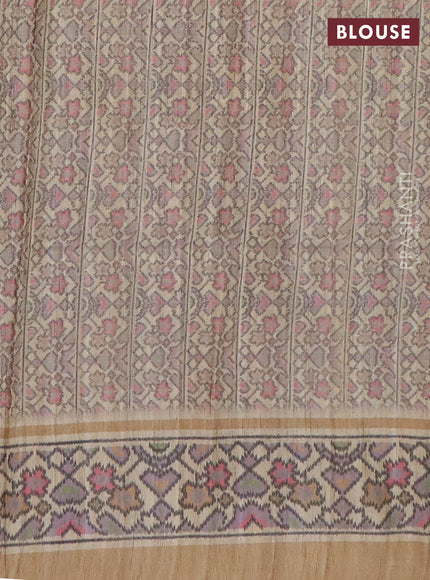 Art tussar saree green and beige with allover prints and patola printed border