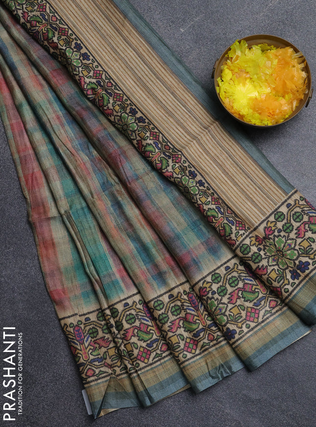 Art tussar saree peacock blue and beige with plain body and patola printed border