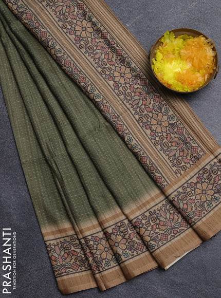 Art tussar saree mehendi green and sandal with allover prints and patola printed border