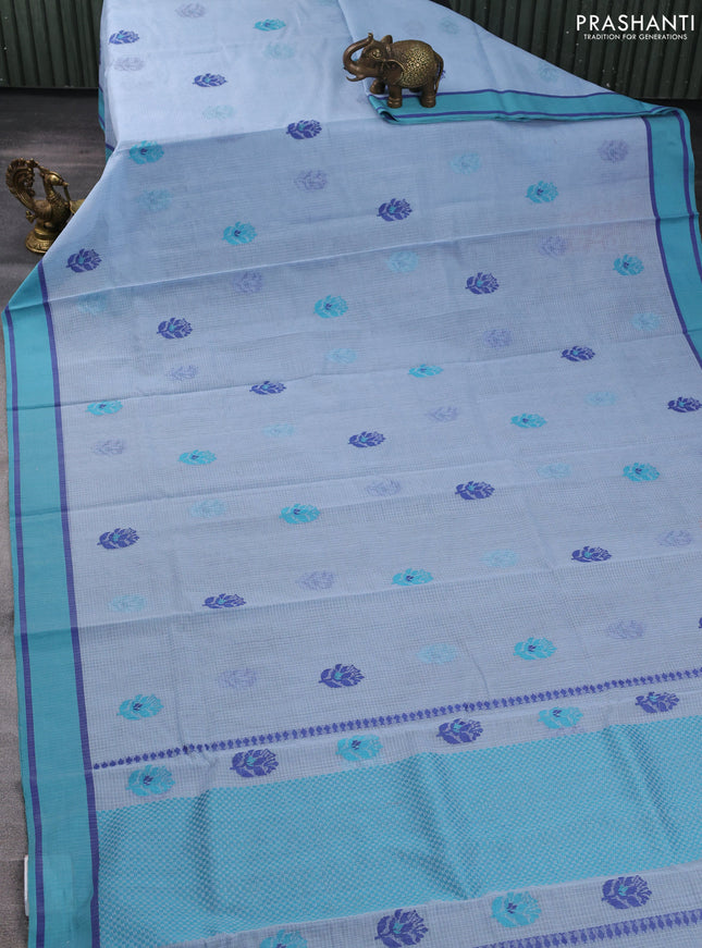 Handloom kota saree pastel blue and blue with floral thread woven buttas and rettapet border