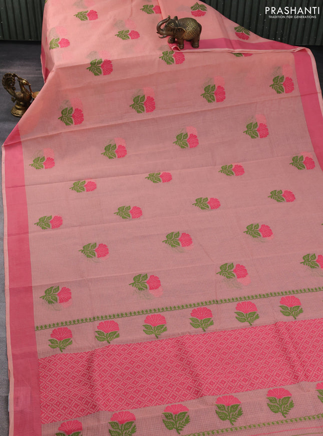 Handloom kota saree peach shade and peach pink with floral thread woven buttas and simple border