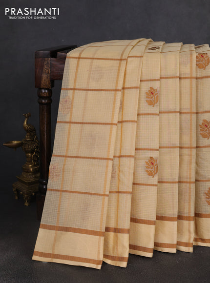 Handloom kota saree beige and dark sandal with allover checks & thread buttas and rettapet border