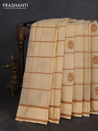 Handloom kota saree beige and dark sandal with allover checks & thread buttas and rettapet border