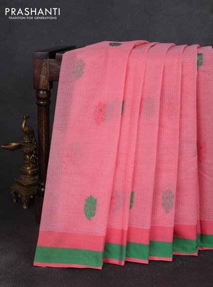 Handloom kota saree peach shade and green with floral thread woven buttas and simple border