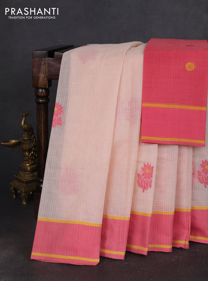 Handloom kota saree pale orange and peach pink with floral thread woven buttas and rettapet border