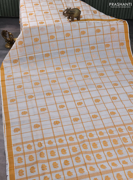 Handloom kota saree off white and mustard yellow with allover checks & thread buttas and simple border