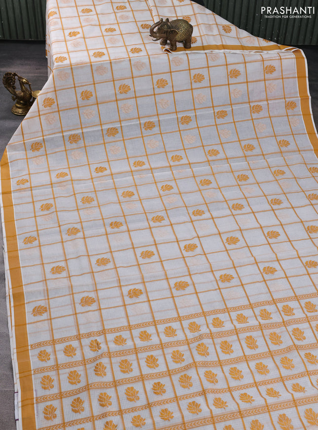 Handloom kota saree off white and mustard yellow with allover checks & thread buttas and simple border