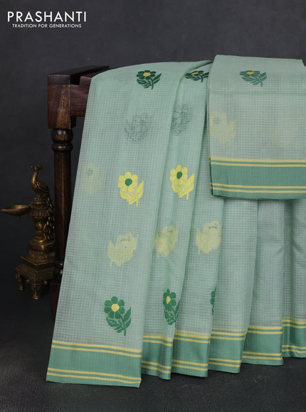 Handloom kota saree pastel green and green with floral thread woven buttas and rettapet border