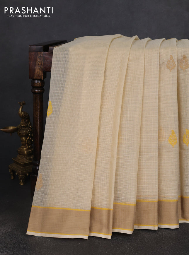 Handloom kota saree cream and beige with thread woven buttas and rettapet border