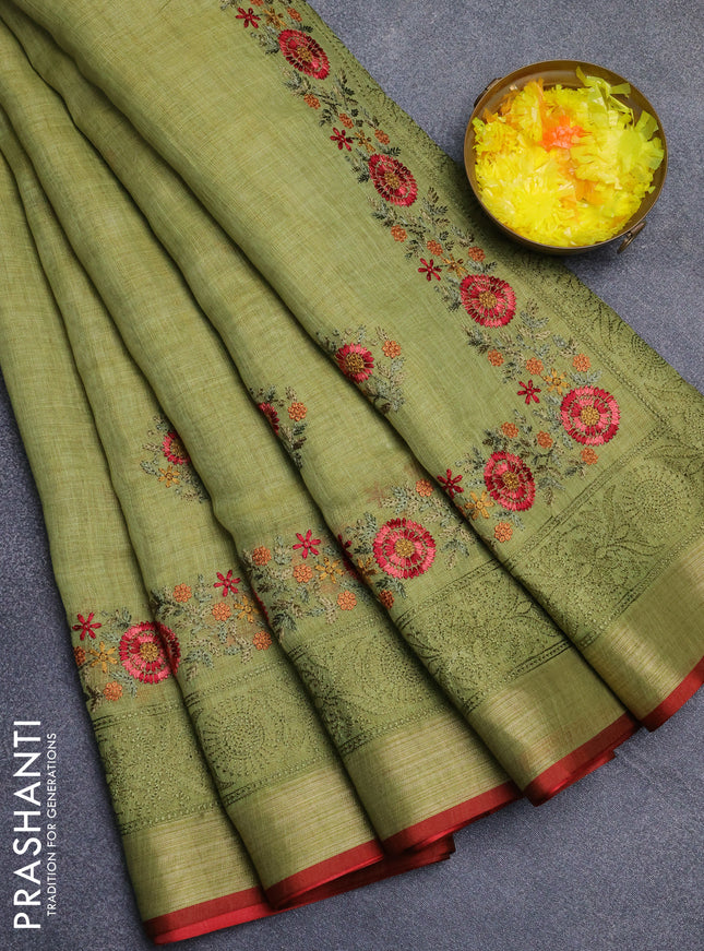Linen cotton saree light green and maroon with embroidery buttas and embroidery zari border