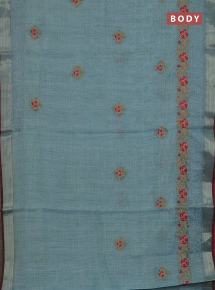 Linen cotton saree pastel blue and maroon with embroidery buttas and embroidery zari border