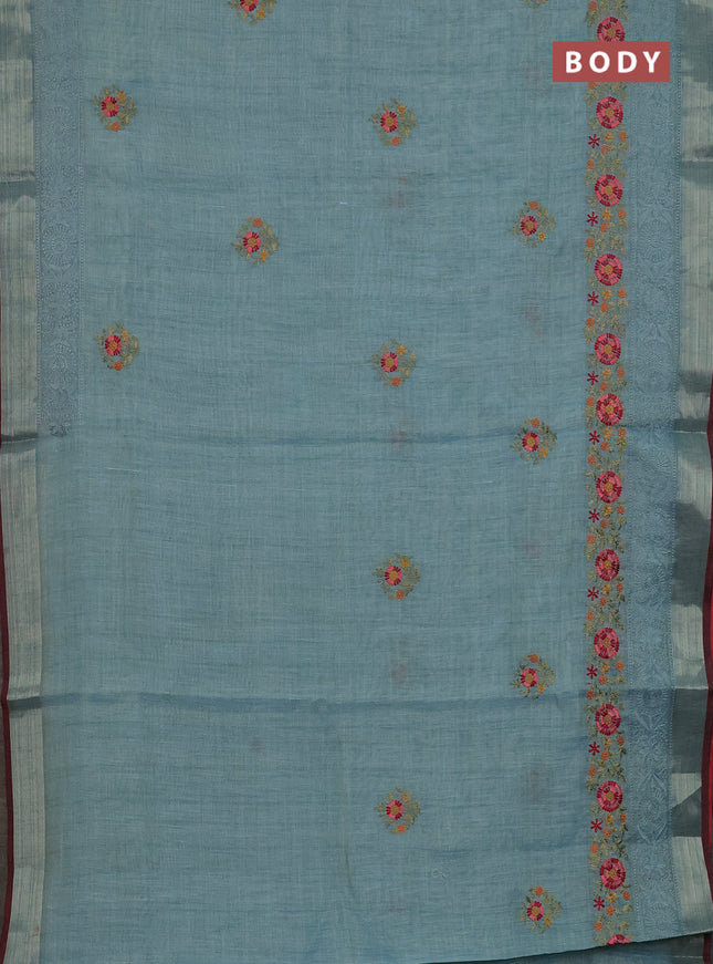 Linen cotton saree pastel blue and maroon with embroidery buttas and embroidery zari border