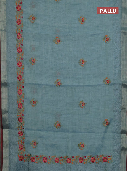 Linen cotton saree pastel blue and maroon with embroidery buttas and embroidery zari border