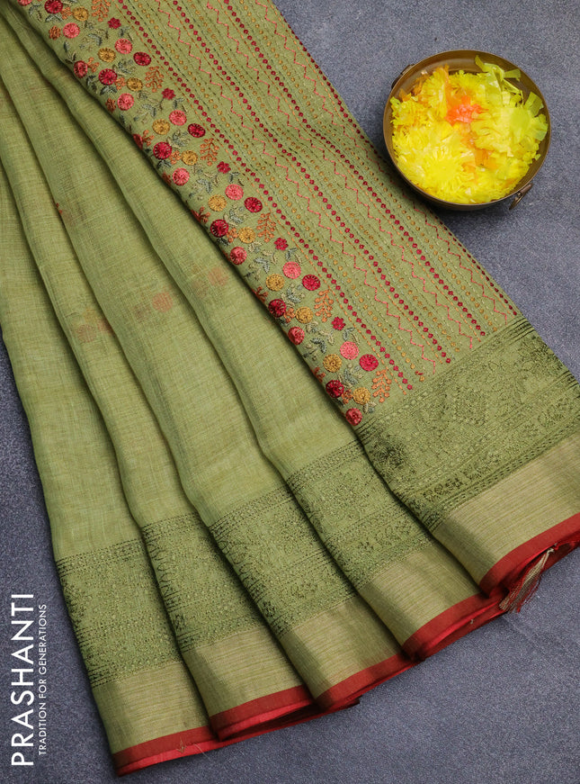 Linen cotton saree light green and maroon with embroidery buttas and embroidery zari border