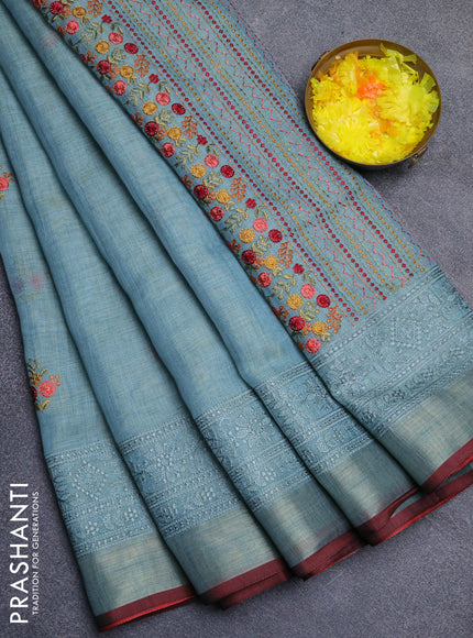 Linen cotton saree pastel blue and maroon with embroidery buttas and embroidery zari border