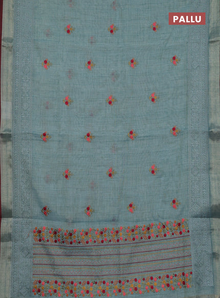 Linen cotton saree pastel blue and maroon with embroidery buttas and embroidery zari border