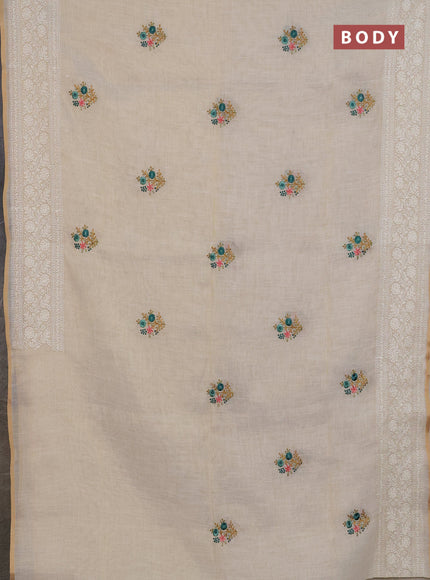 Linen cotton saree cream and teal green with embroidery buttas and embroidery zari border
