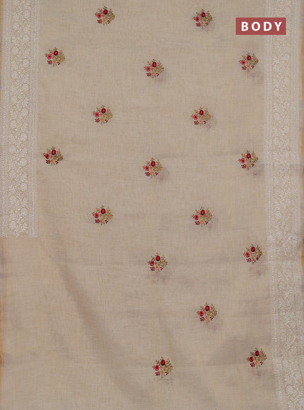 Linen cotton saree cream and maroon with embroidery buttas and embroidery zari border