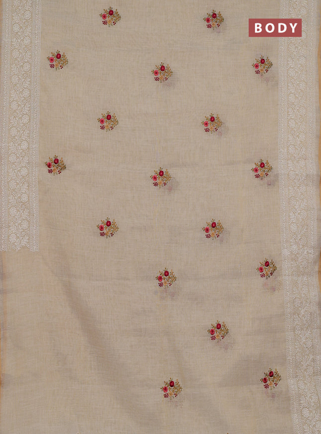 Linen cotton saree cream and maroon with embroidery buttas and embroidery zari border