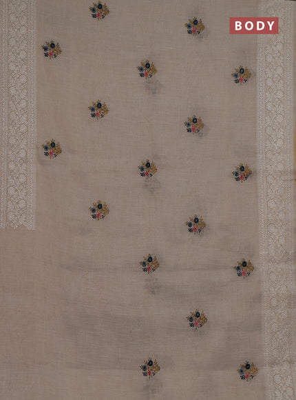 Linen cotton saree cream and dark mustard with embroidery buttas and embroidery zari border