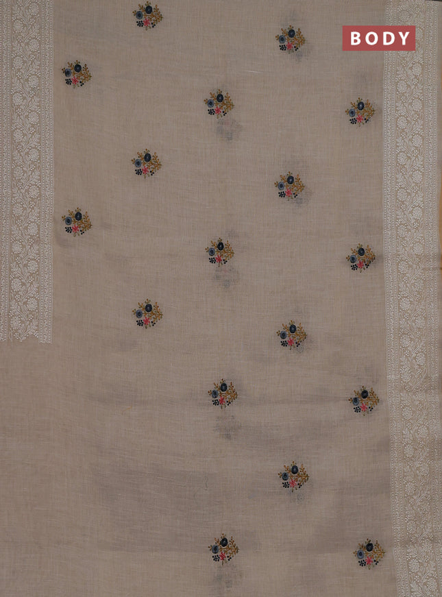 Linen cotton saree cream and dark mustard with embroidery buttas and embroidery zari border