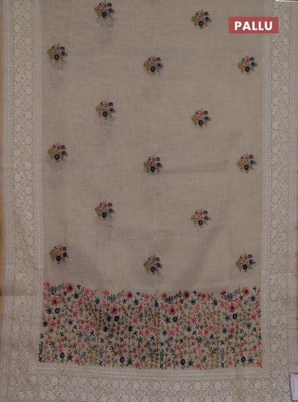 Linen cotton saree cream and dark mustard with embroidery buttas and embroidery zari border