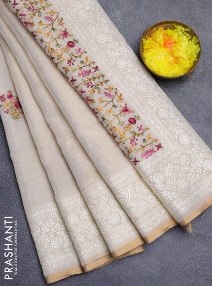 Linen cotton saree cream and mustard yellow with embroidery buttas and embroidery zari border
