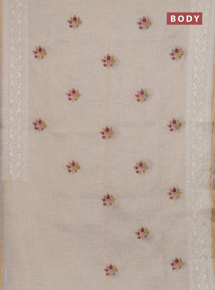 Linen cotton saree cream and mustard yellow with embroidery buttas and embroidery zari border