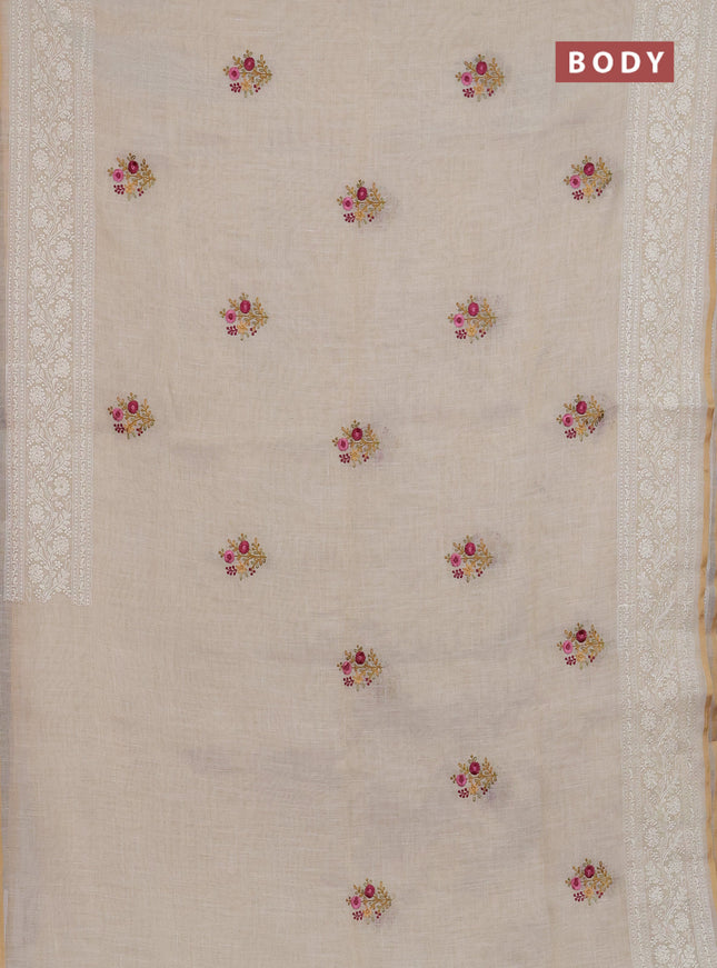 Linen cotton saree cream and mustard yellow with embroidery buttas and embroidery zari border