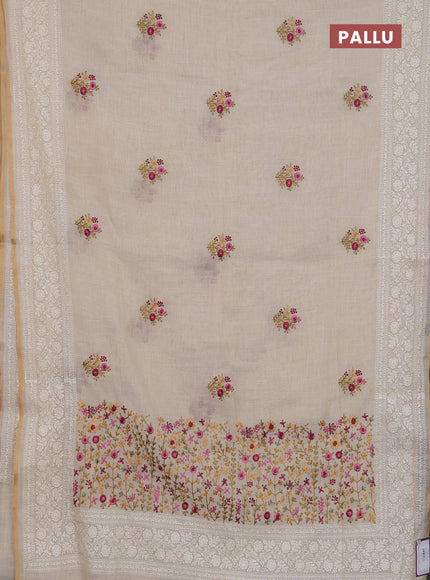Linen cotton saree cream and mustard yellow with embroidery buttas and embroidery zari border