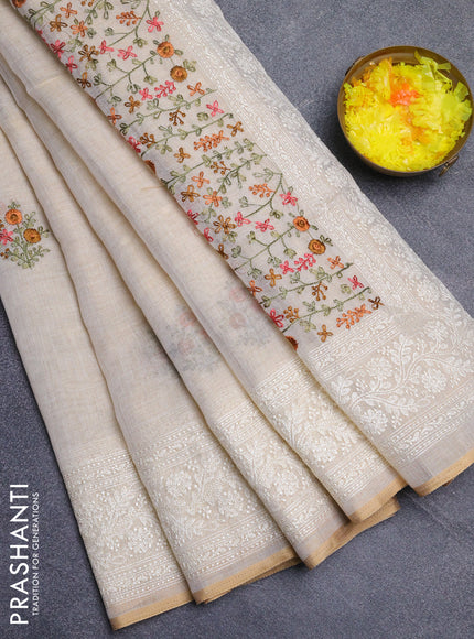 Linen cotton saree cream and rust shade with embroidery buttas and embroidery zari border