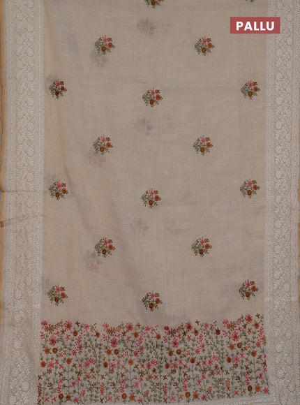 Linen cotton saree cream and rust shade with embroidery buttas and embroidery zari border