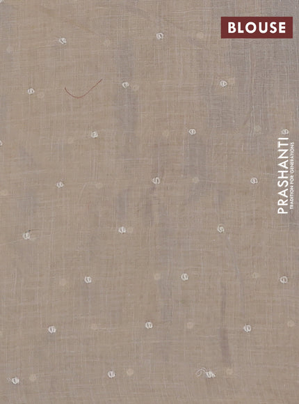 Linen cotton saree cream and rust shade with embroidery buttas and embroidery zari border