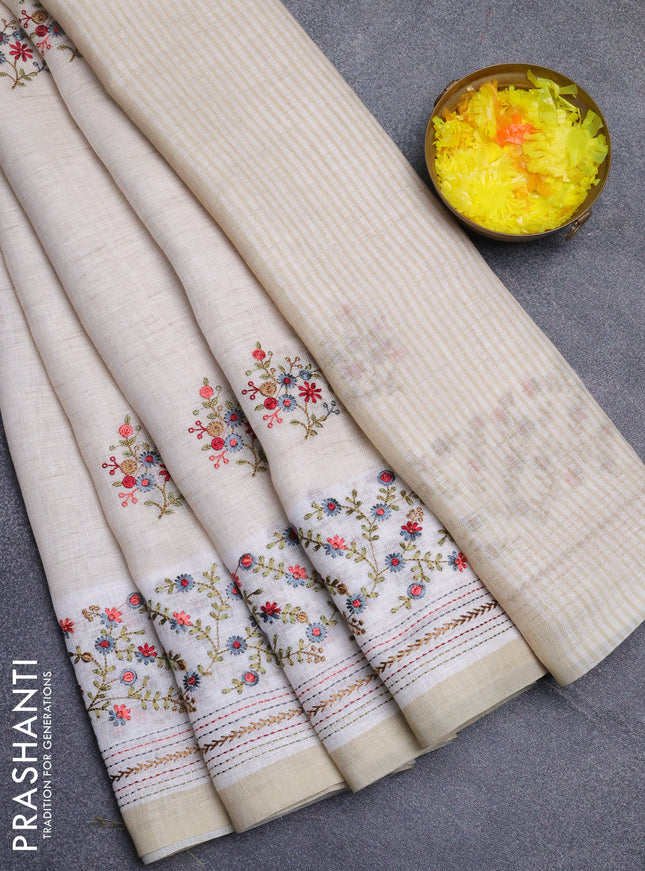 Linen cotton saree cream and grey with embroidery buttas and embroidery simple border