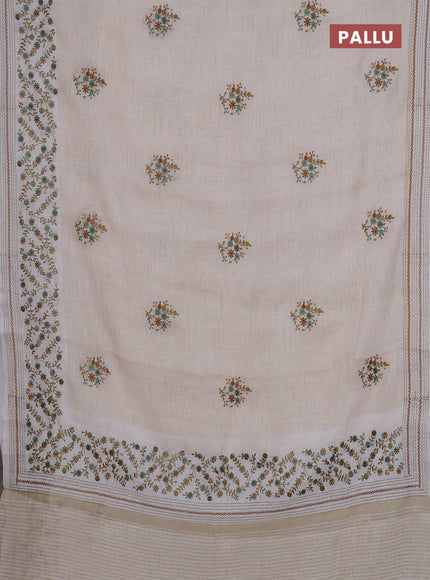 Linen cotton saree cream and teal green with embroidery buttas and embroidery simple border