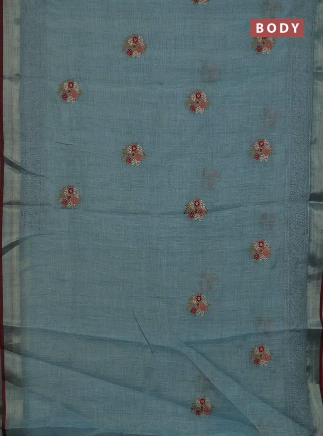 Linen cotton saree pastel blue and maroon with embroidery buttas and embroidery zari border