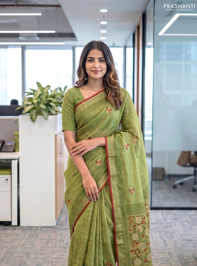 Linen cotton saree light green and maroon with embroidery buttas and embroidery zari border