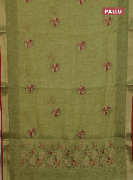 Linen cotton saree light green and maroon with embroidery buttas and embroidery zari border