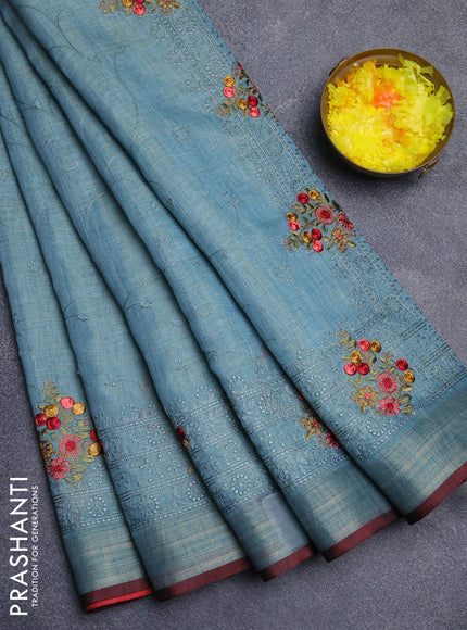 Linen cotton saree pastel blue and maroon with allover embroidery work and zari woven border