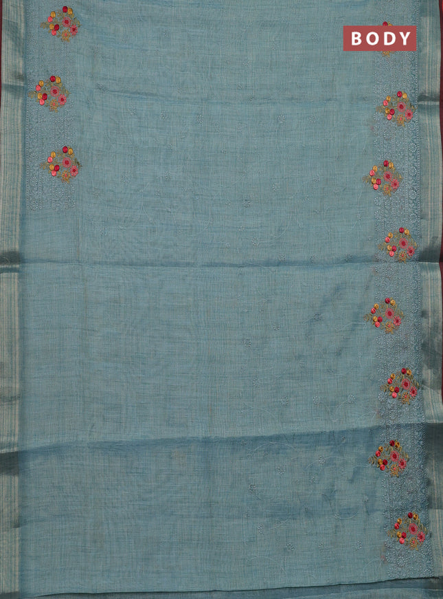 Linen cotton saree pastel blue and maroon with allover embroidery work and zari woven border