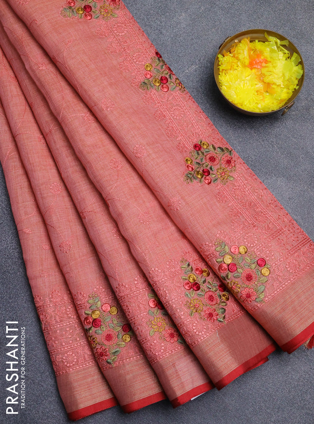 Linen cotton saree peach shade and red with allover embroidery work and zari woven border