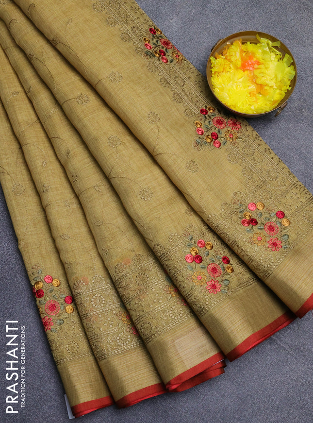 Linen cotton saree mustard yellow and maroon with allover embroidery work and zari woven border