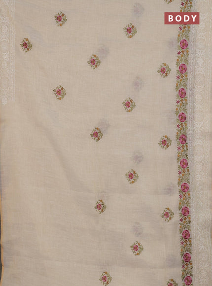 Linen cotton saree cream and mustard yellow with embroidery buttas and embroidery work zari border