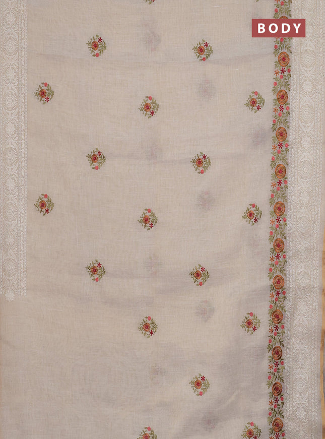 Linen cotton saree cream and maroon with embroidery buttas and embroidery work zari border