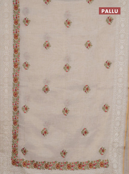 Linen cotton saree cream and maroon with embroidery buttas and embroidery work zari border