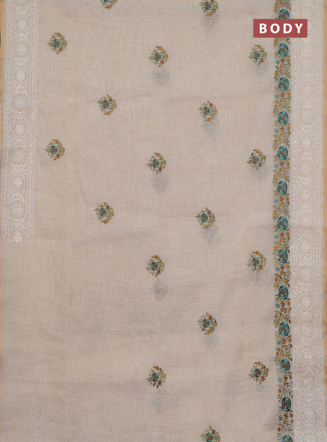 Linen cotton saree cream and teal blue with embroidery buttas and embroidery work zari border